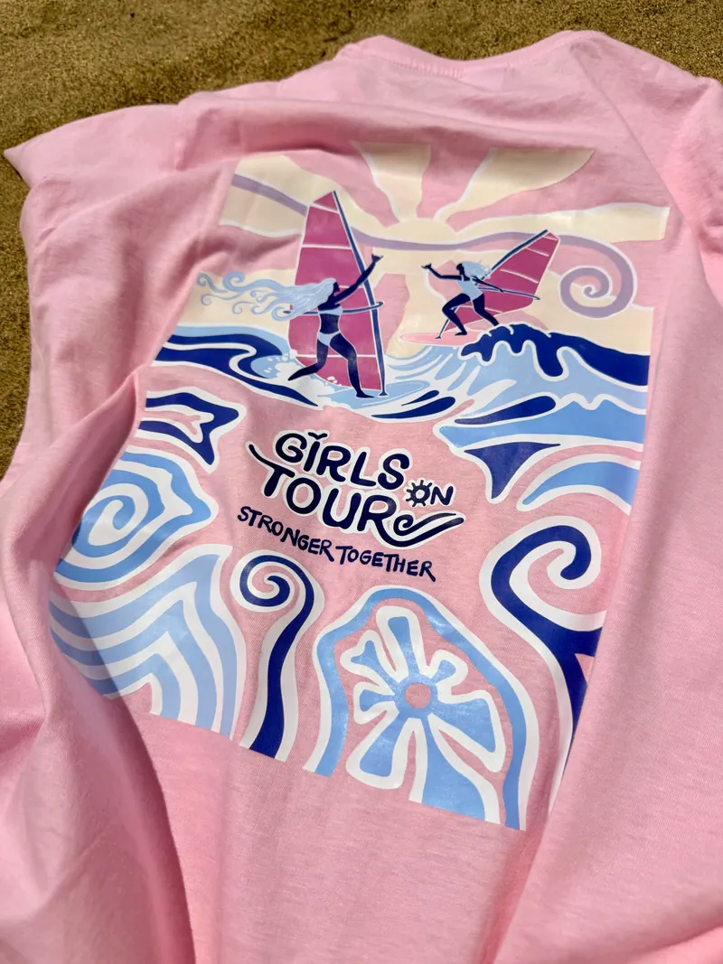 Close-up of the Girls on Tour back print: two windsurfers riding waves above the words Stronger together