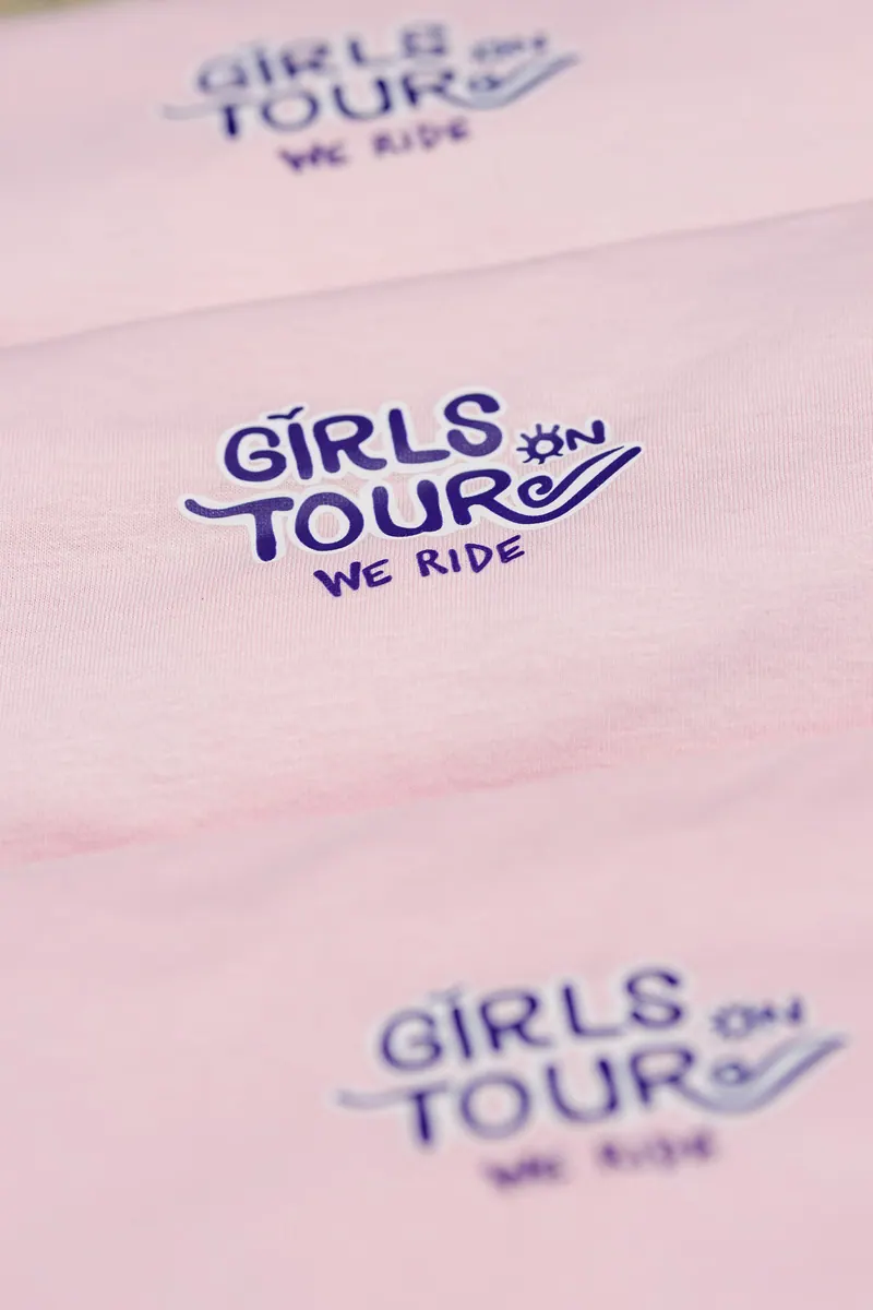 The Girls on Tour crew wearing the merch